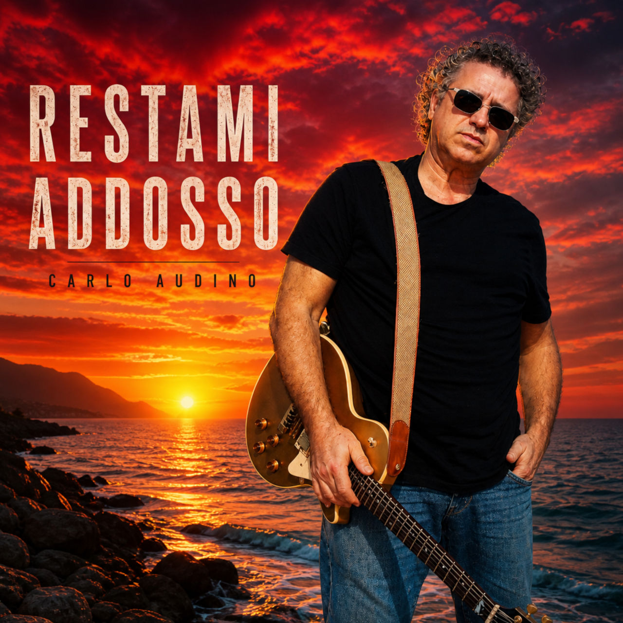 Il cantautore e musicista romano Carlo Audino torna con “Restami addosso” Il cantautore e musicista romano Carlo Audino torna con “Restami addosso”